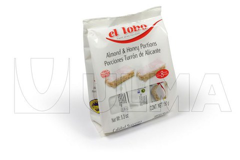 Nougat candy packaging in VFFS machine in flat bottom pack and laminated film.