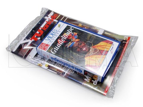 Magazine and video packaging in flow pack wrapper (HFFS)