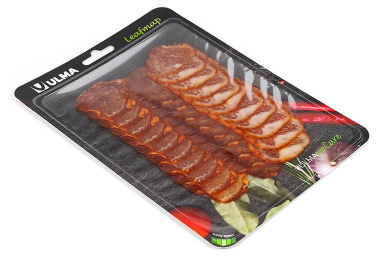 Traysealing sliced pork loin in cardboard tray Leafmap.jpg Traysealing sliced pork loin in cardboard tray Leafmap.jpg