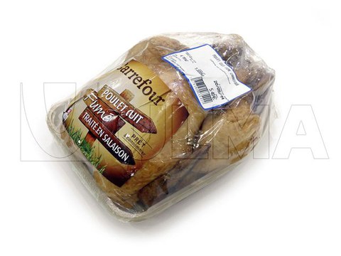 Envasado de pollo asado entero con bandeja en flow pack con film retráctil barrera BDF®