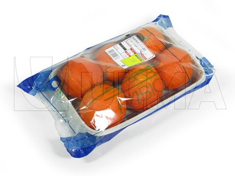Envasado de naranjas en bandeja de cartón en flow pack (hffs)