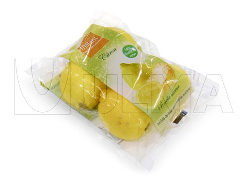 Envasado de agrupación de limones sin bandeja en flow pack