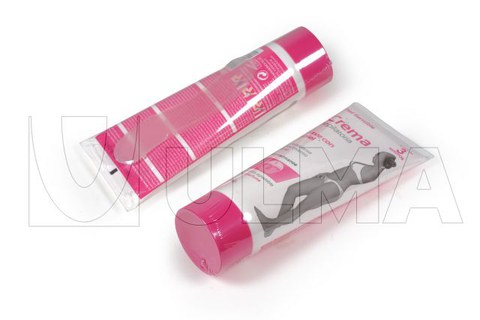 Embolsado y retractilado de tubos de crema depilatoria con espátula en film poliolefina