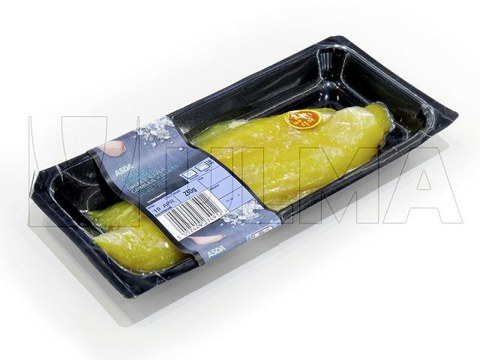 Envasado de filetes de panga ahumada en skin termoformado