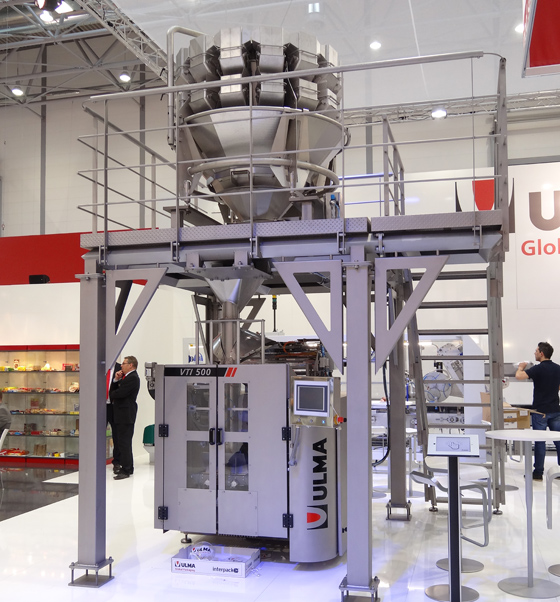 Envolvedora vertical ULMA VTI 540 con multicabezal Marel IQF en Interpack